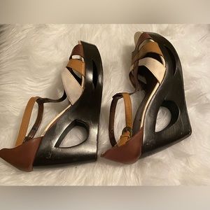 Sandals in excellent used condition. White, Tan, and Brown. Size 12M